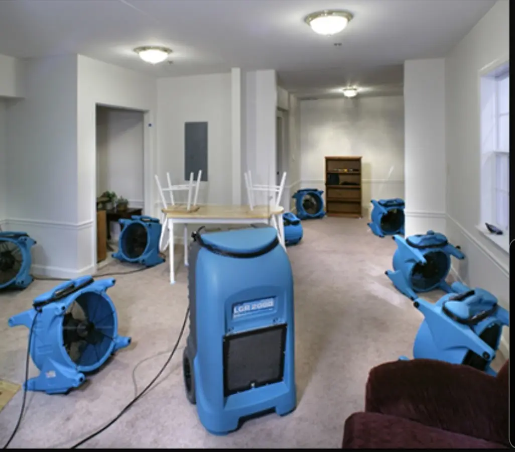 Air movers and dehumidifier setup for Water Damage Restoration in Red Oak
